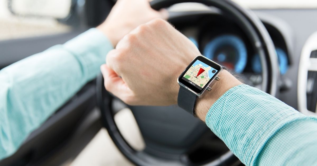 Distracted Driver Looking at His Smart Watch
